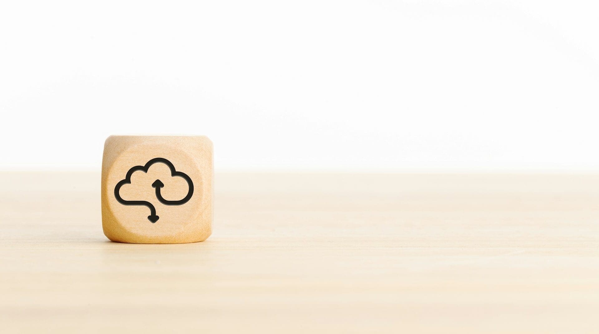 Cloud computing icon on wooden block