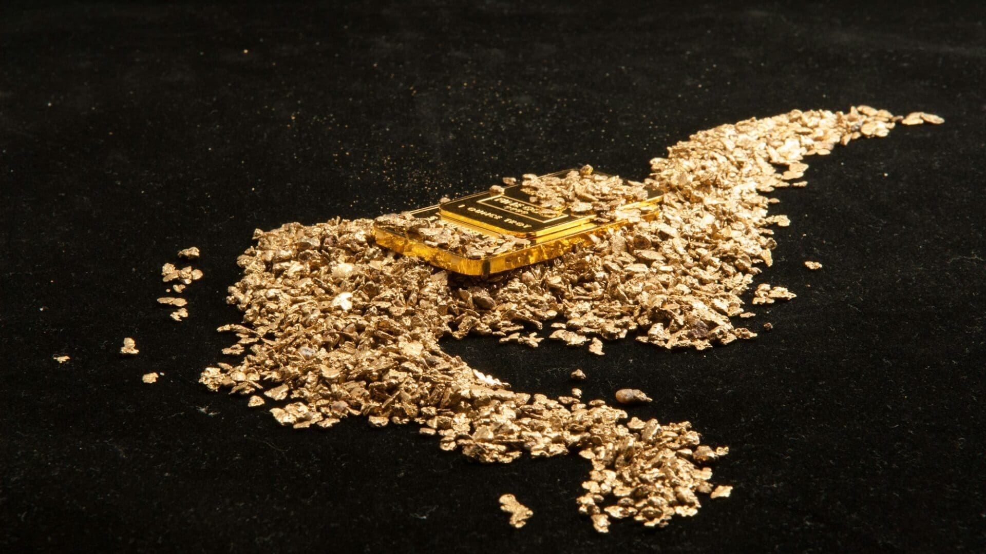 gold in coins, nuggets and ingots